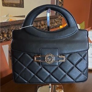 Designer luxury, vegan leather, Italian handbag.